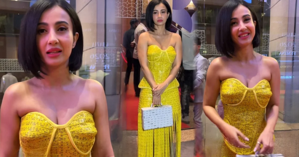 Monami Ghosh, Tollywood fashion, measurement tape dress, viral fashion, red carpet look, bold fashion, fashion controversy, Urfi Javed comparison, celebrity style, Bengali actress, মনামী ঘোষ, টলিউড ফ্যাশন, মেজারমেন্ট টেপ ড্রেস, ভাইরাল লুক, রেড কার্পেট, সাহসী ফ্যাশন, ফ্যাশন বিতর্ক, উরফি জাভেদ তুলনা, সেলিব্রিটি স্টাইল, বাংলা অভিনেত্রী