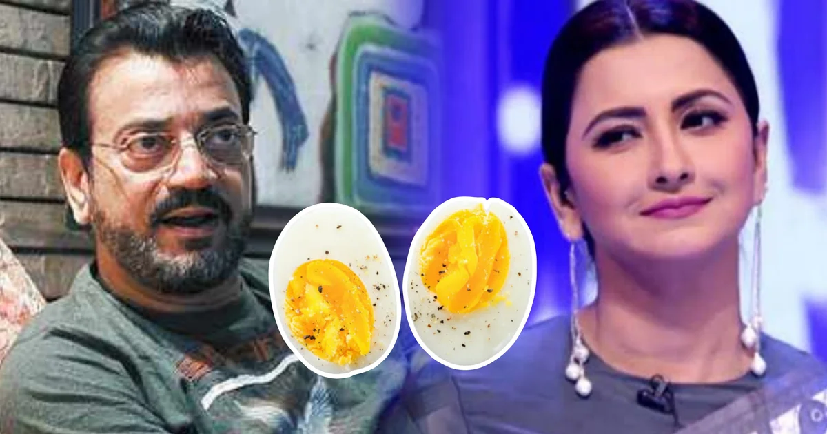 "ডিমের আকৃতিটা অসাধারণ, আমি তো ডিমের ভীষণ ভক্ত..." "রচনা এখন দারুণ মুখপাত্র হয়েছে, জমিয়ে দিয়েছে...ওর এত গুণ আগে জানা ছিল না!" 'ডিম থেরাপি' থেকে রচনার 'আরবানায় থাকতে যোগ্যতা', রসিকতার আড়ালে কি প্রাক্তন দলকে খোঁচা দিলেন চিরঞ্জিত চক্রবর্তী? পালাবদলের আবহে আর কাদের একহাত নিলেন অভিনেতা? 1 Chiranjeet Chakraborty, Rachana Banerjee, Bengal Politics, TMC, Political Controversy, Egg Protest, Bengali Actor, Political Statement, Viral Video, Entertainment, চিরঞ্জিত চক্রবর্তী, রচনা বন্দ্যোপাধ্যায়, তৃণমূল কংগ্রেস, বাংলার রাজনীতি, ডিম ছুঁড়ে মারা, রাজনৈতিক বিতর্ক, বাঙালি অভিনেতা, ভাইরাল ভিডিও, রাজনৈতিক মন্তব্য, বিনোদন