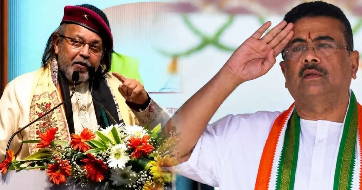 "এত সব মন্ত্রীর ভিড়ে প্রতিমন্ত্রী হওয়ার যোগ্যতা আমার নেই" ‘সতিমন্ত্রী’ হয়েই মঞ্চে মিঠুন চক্রবর্তী! ‘জলঢোড়া-বেলেবোড়া নই, আমি জাতগোখরো’, আয়ুষ্মান ভারতের অনুষ্ঠানে ফের সেই সংলাপে মাতালেন মহাগুরু! জোর গলায় বললেন, "আগে এই ডায়লগের জন্যই আমার ওপর মামলা হয়েছিল, তাই আজকে আরও জোরে বললাম!" 1 Mithun Chakraborty, Ayushman Bharat, Mithun Speech, Mithun Dialogue, Ayushman Bharat Bengal, Suvendu Adhikari, Bengali Actor, Mahaguru Mithun, Mithun Chakraborty Viral Video, Tollywood, মিঠুন চক্রবর্তী, আয়ুষ্মান ভারত, মিঠুনের বক্তব্য, মিঠুনের সংলাপ, আয়ুষ্মান ভারত বাংলা, শুভেন্দু অধিকারী, বর্ষীয়ান অভিনেতা, মহাগুরু, ভাইরাল ভিডিও, টলিউড